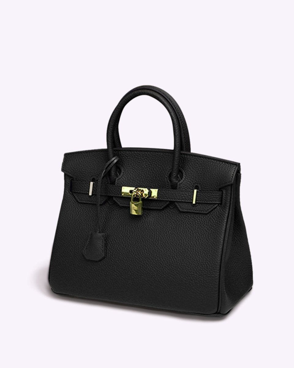 Luxury leather handbag styled for professional office setting