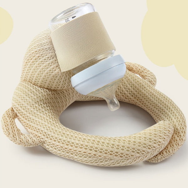 Knit-finish baby bottle holder pillow in pink with infant feeding independently