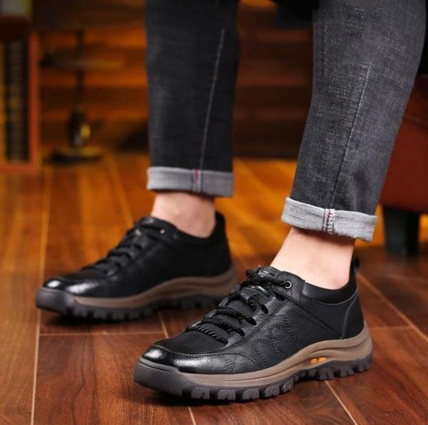 Interior view of men's orthopaedic boots revealing breathable lining and ergonomic insole structure.
